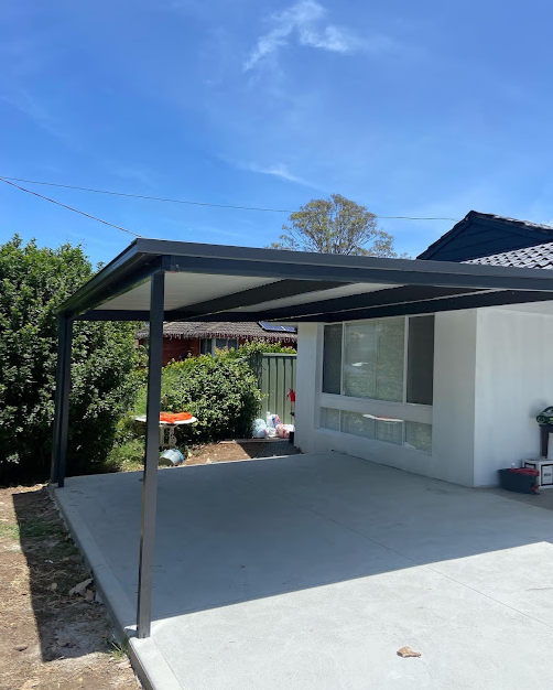 Carport installation with concrete slab